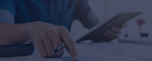 What is a ISA image - person working with pen and paper